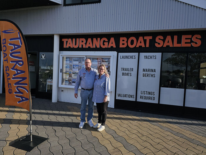 Team from Tauranga Boat Sales standing outside their office at Tauranga Bridge Marina, Bay of Plenty.